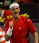 El argentino Nalbandian frena a Federer y gana Copa de Maestros El argentino Nalbandian frena a Federer y gana Copa de Maestros