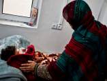 Niña enferma en Afganistán Niña enferma en Afganistán