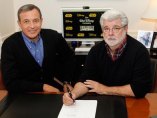 Robert A. Iger y George Lucas Robert A. Iger y George Lucas