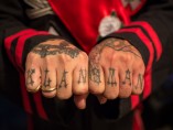 "Klansman" tattoo on the hands of an Imperial Knighthawk (security position)