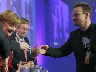 Bono, con Merkel