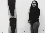 'Ana Mendieta with Untitled wood sculpture', 1984-85