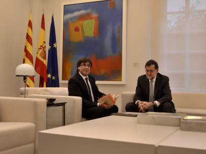 Mariano Rajoy y Carles Puigdemont.