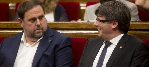 Carles Puigdemont y Oriol Junqueras