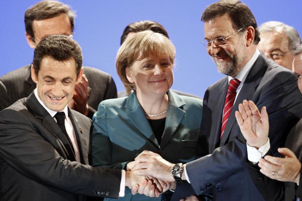 Sarkozy, Merkel y Rajoy Sarkozy, Merkel y Rajoy