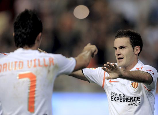 Villa y Mata celebran un tanto Villa y Mata celebran un tanto