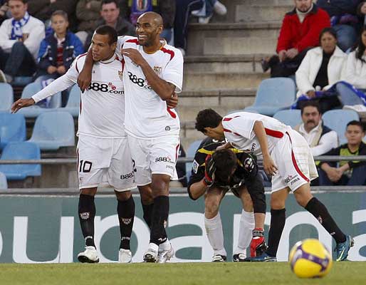 Luis Fabiano y Kanouté Luis Fabiano y Kanouté
