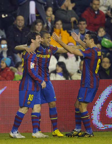 Alves, Messi y Xavi Alves, Messi y Xavi