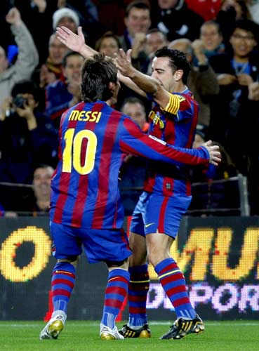 Messi y Xavi Messi y Xavi