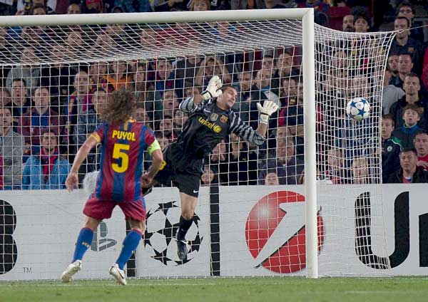 José Manuel Pinto y Carles Puyol José Manuel Pinto y Carles Puyol