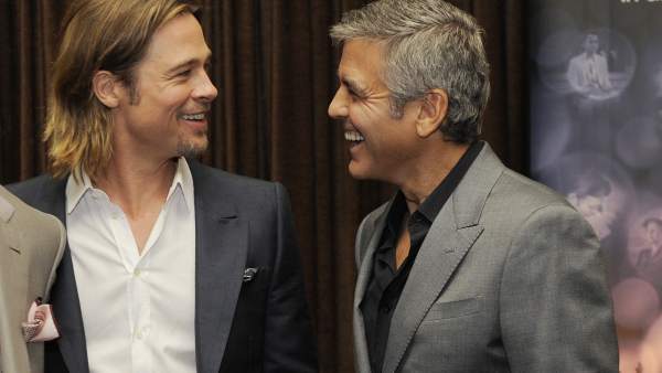 George Clooney y Brad Pitt George Clooney y Brad Pitt