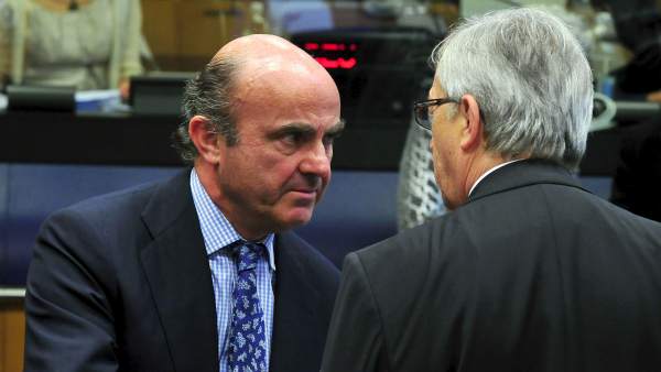 De Guindos y Juncker De Guindos y Juncker