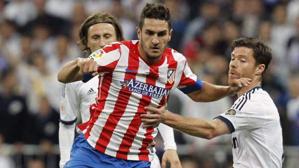 Koke con Xabi Alonso Koke con Xabi Alonso