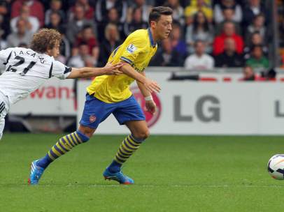 Mesut Özil y José Cañas