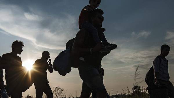 Inmigrantes cruzando la frontera Inmigrantes cruzando la frontera