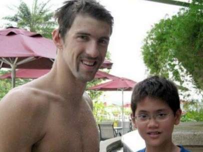 Joseph Schooling y Michael Phelps