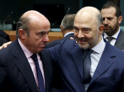 Luis de Guindos y Pierre Moscovici