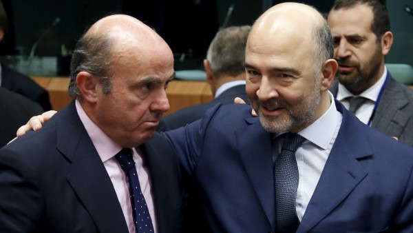Luis de Guindos y Pierre Moscovici Luis de Guindos y Pierre Moscovici