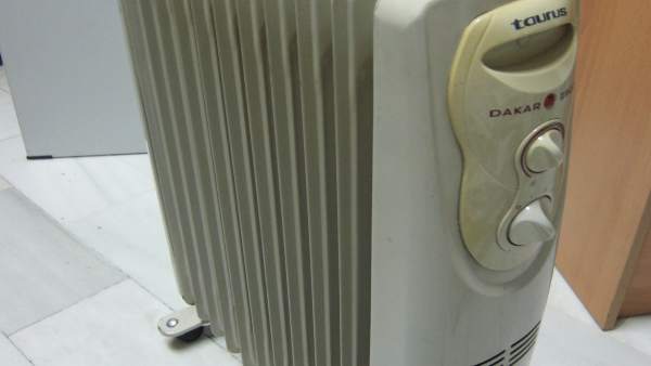Un calefactor. Radiador. Estufa. Climatización Un calefactor. Radiador. Estufa. Climatización