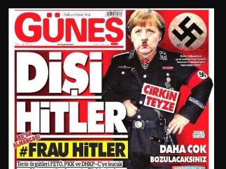 Merkel caricariturizada como Hitler
