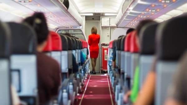 Pasajeros en un avión Pasajeros en un avión