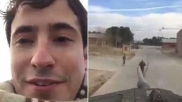 Hombre subido a un tanque Hombre subido a un tanque