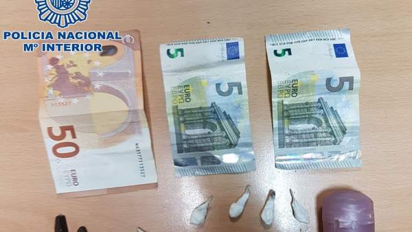 Dinero y droga incautada Dinero y droga incautada
