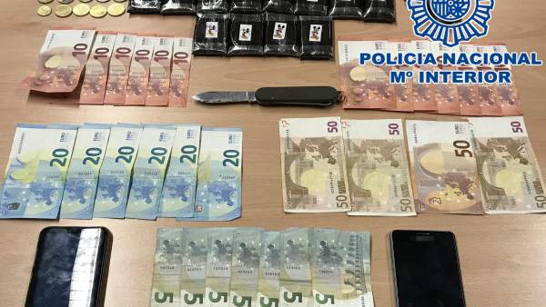 Dinero y droga incautados Dinero y droga incautados