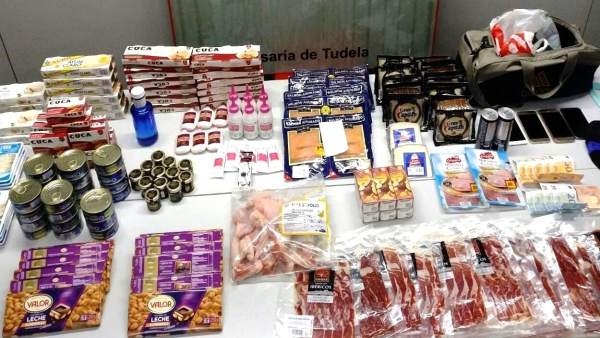 Comida y dinero intervenidos a los detenidos Comida y dinero intervenidos a los detenidos
