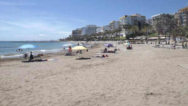 Playa turismo turistas sol marbella arena orilla mar viajeros relax litoral Playa turismo turistas sol marbella arena orilla mar viajeros relax litoral