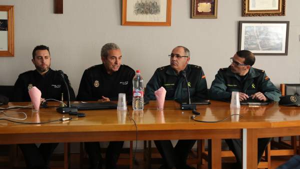 Representantes de ambos cuerpos policiales