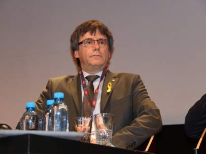 El expresidente de la Generalitat Carles Puigdemont en un debate en Ginebra