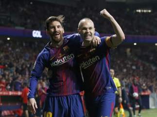 Iniesta y Messi, del Barça.