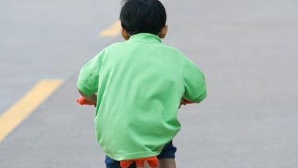 Niño en bicicleta Niño en bicicleta
