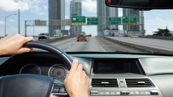 Car Driver Hands. People Driving On Driveway. Car Driver Hands. People Driving On Driveway.