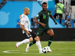 Mascherano y Obi Mikel