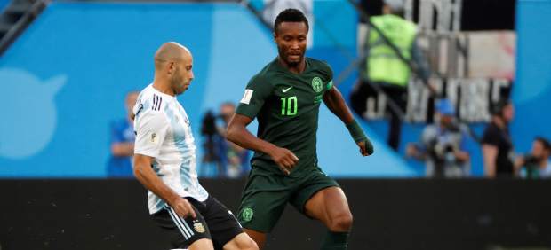 Mascherano y Obi Mikel