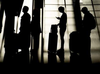 Pasajeros en un aeropuerto
