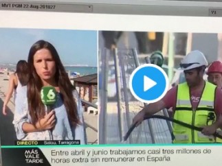 Un hombre besa la cabeza de la periodista de 'Más vale tarde' Elisabeth López