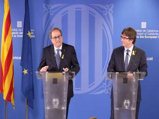 El presidente del Govern, Quim Torra, con el expresidente Carles Puigdemont