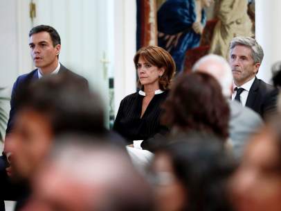 El presidente del Gobierno, con sus ministros de Justicia e Interior.