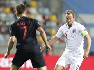 Ivan Rakitic y Harry Kane.