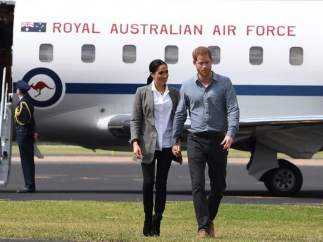 El príncipe Enrique de Inglaterra y su esposa Meghan