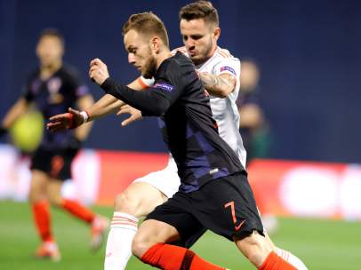 Rakitic y Saúl