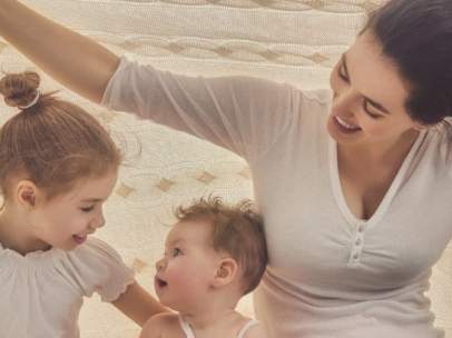Madre con sus hijos