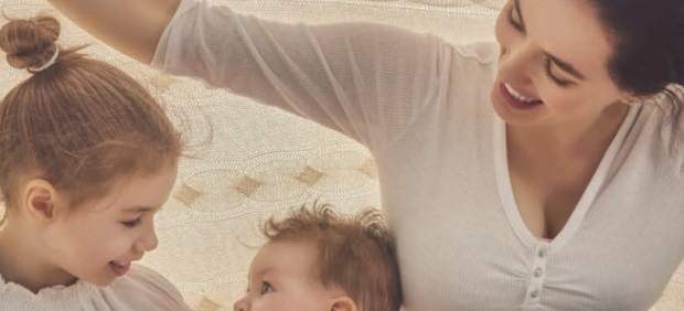 Madre con sus hijos