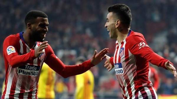 Correa y Lemar celebran un gol. Correa y Lemar celebran un gol.