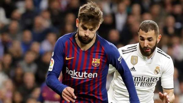 Gerard Piqué, con Karim Benzema. Gerard Piqué, con Karim Benzema.
