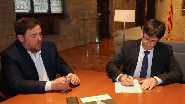 El pte. Carles Puigdemont y el vpte. Oriol Junqueras El pte. Carles Puigdemont y el vpte. Oriol Junqueras