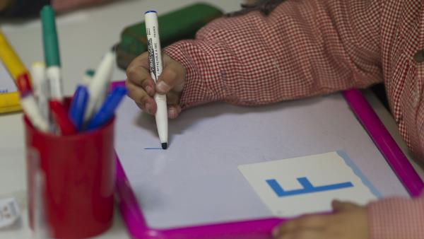 Un niño en el aula Un niño en el aula
